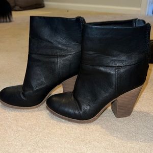 Ladies, 3in heel. Color is black with brown heel, size 7 Med. like new